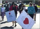  ?? PETE BANNAN - MEDIANEWS GROUP ?? Delaware County Council members Dr. Monica Taylor, Elaine Paul Schaefer and Christine Reuther carried signs of support for staff and residents at Fair Acres Wednesday evening.