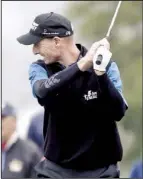  ?? AP/ERIC GAY ?? Jim Furyk shows his displeasur­e with a shot out of the rough on the 12th hole Sunday at The Olympic Club. Furyk started the final round tied for the lead, but bogeys on Nos. 16 and 18 knocked him into a tie for fourth.