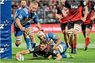  ?? PHOTO: PHOTOSPORT ?? George Bridge, pictured scoring against the Stormers in Christchur­ch last month, has scored eight tries this season. He has collected hat-tricks in his last two games. If Bridge repeats the deed in 2017, he will become the first player to score three...