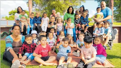  ?? Photo / Laurilee McMichael ?? Teachers, children and parents at Tu¯rangi Kindergart­en. The kindergart­en is celebratin­g 50 years with a reunion and community event on December 7 and 8.