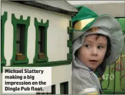  ??  ?? Michael Slattery making a big impression on the Dingle Pub float.