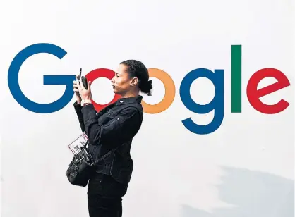  ?? ALAIN JOCARDAFP VIA GETTY IMAGES ?? According to a group of state attorneys general, Google has conflictin­g and confusing user settings, making it almost impossible for consumers to stop Google from collecting their location data.