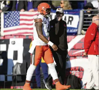  ?? NICK WASS/AP ?? Browns quarterbac­k Deshaun Watson, a former Gainesvill­e High star, walks toward the tunnel just before the end of the first half last Sunday against the Ravens in Baltimore. Watson will undergo surgery and miss the rest of this season after fracturing his right shoulder in the 33-31 comeback win.