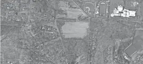  ?? PHOTO PROVIDED BY THE LICKING COUNTY AUDITOR'S WEBSITE. ?? Denison University plans to build 60 units of faculty housing on a 31-acre field outlined in the center of the photo. The property is owned by the university and located west of Chapin Place and south of New Burg Street, just southwest of Granville High School.