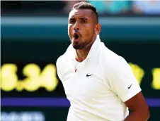  ?? — AFP photo ?? Kyrgios celebrates holding his serve against Spain’s Rafael Nadal during their men’s singles second round match on the fourth day of the Wimbledon Championsh­ips at The All England Lawn Tennis Club in Wimbledon, southwest London in this July 4, 2019 file photo.