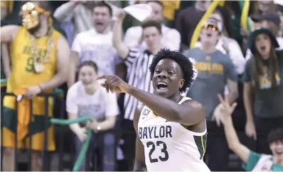  ?? (AP Photo/Rod Aydelotte, File) ?? Baylor forward Jonathan Tchamwa Tchatchoua points up court after scoring a 3-point play against Texas Tech in the second half of an NCAA college basketball game, Saturday, Feb. 4, 2023, in Waco, Texas. Tchamwa Tchatchoua sees himself as a “walking miracle” after getting back on the court for 14th-ranked Baylor nearly a full year after a gruesome knee injury that many people thought would end his career.
