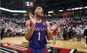  ?? BRAD TOLLEFSON - THE ASSOCIATED PRESS ?? Kansas’ Devon Dotson (1) celebrates after an NCAA college basketball game against Texas Tech, Saturday, March 7, 2020, in Lubbock, Texas.