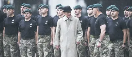  ?? Associated Press ?? Britain’s Prince Philip, center, attends a parade at Buckingham Palace Wednesday in London.