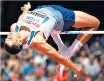  ??  ?? High hopes: Robbie Grabarz in action during yesterday’s high-jump qualifying