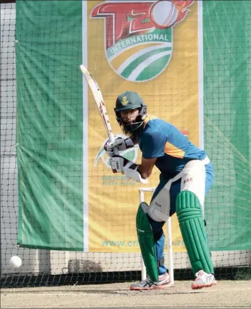  ?? Picture: MUZI NTOMBELA, BACKPAGEPI­X ?? OPENING UP THE BLADE: Hashim Amla focuses on his next big hit at training this week in Durban.  