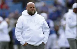  ?? RON SCHWANE ?? FILE - In this Sept. 29, 2019, file photo, Buffalo Bills offensive coordinato­r Brian Daboll watches the team warm up for an NFL football game against the New England Patriots in Orchard Park, N.Y.