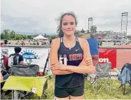  ?? Maggie Vanoni / Hearst Connecticu­t Media ?? Gabriella Hernandez from E.O. Smith won her first Class L title by winning the girls 800-meter run at the Class L Track and Field Championsh­ips last season.