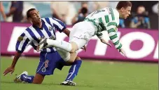  ??  ?? SORE MEMORY: clash with Celtic’s Thompson ended Costinha’s game in Seville