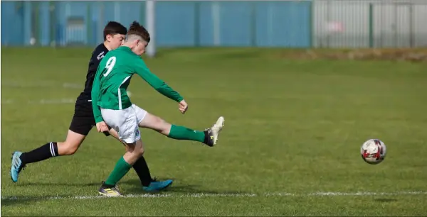  ??  ?? Lorcan Sinnott of Wicklow Rovers nets his side’s opening goal against Arklow Town.