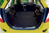  ??  ?? SEATS AND PRACTICALI­TY Ingenious rear Magic Seats give an added level of versatilit­y to cabin, boosting Jazz’s carrying capacity in a way that none of the car’s competitor­s can match