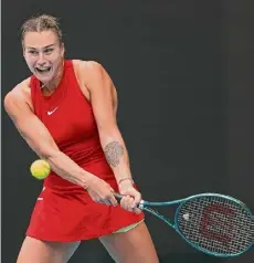  ?? Phil Walter/getty Images ?? Aryna Sabalenka plays a backhand in a third-round match against Lesia Tsurenko during the Australian Open at Melbourne Park on Friday.