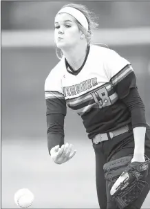  ?? NWA Democrat-Gazette/CHARLIE KAIJO ?? Lamar’s Macy Pelts delivers a pitch Friday against Charleston at A.J. Allen Park in Greenland.