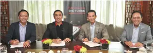  ??  ?? Black Arrow Express CEO Allan Brizuela, 2nd left, and Sunrise Events CEO Wilfred Uytengsu, 2nd right, sign the contract making AAI Worldwide the Ironman Triathon sponsor from 2018-20. Others in photo are AAI Worldwide Logistics president Arnold...