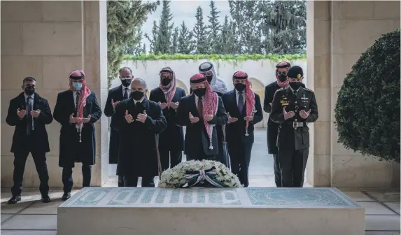  ?? Royal Hashemite Court ?? Jordan’s King Abdullah II, Crown Prince Hussein bin Abdullah, and Prince Hassan bin Talal, and, behind them, Princes Rashid bin Hassan, Hamzah bin Hussein, Feisal bin Hussein, Talal bin Muhammed, Hashim bin Hussein, Ali bin Hussein and Ghazi bin Muhammed visit the tomb of King Hussein yesterday