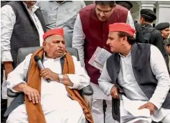  ?? MANEESH AGNIHOTRI ?? SCATHING ATTACK SP patriarch Mulayam and son Akhilesh after the SP-BSP pact was announced, Feb. 21