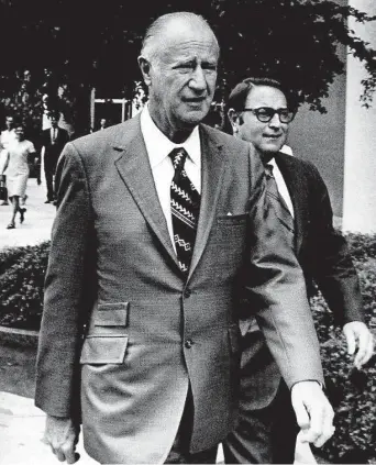  ?? Houston Chronicle file ?? Frank Sharp, left, and his attorney, Jerry G. Hill, leave the federal courthouse in Houston after a deposition session in a stock fraud case. Sharp pleaded guilty and received a fine and probation.