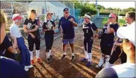  ?? Christian Abraham / Hearst Connecticu­t Media ?? Brakettes’ Manager John Stratton speaks with the team before a 2017 game at DeLuca Field in Stratford.