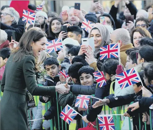  ?? PICTURE: SIMON HULME ?? ALL SMILES: Kate, the Duchess of Cambridge, meets well-wishers in Centenary Square, Bradford, on her first official engagement of the year.