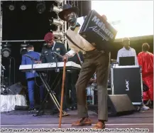  ??  ?? Jah Prayzah fan on stage during MdharaVach­auya album launch in Harare