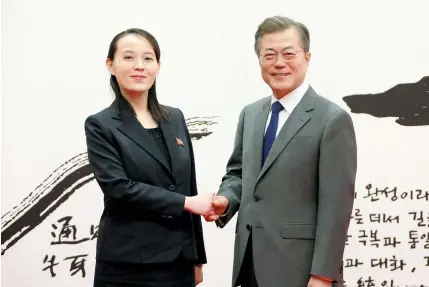  ?? REUTERS ?? Kim Yo-jong shakes hands with South Korean President Moon Jae-in during her recent trip.