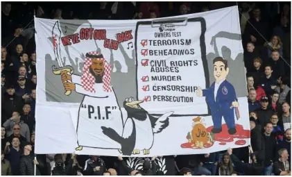  ?? Photograph: Simon Dael/Shuttersto­ck ?? A banner held up by Crystal Palace fans before the club’s game against Newcastle.