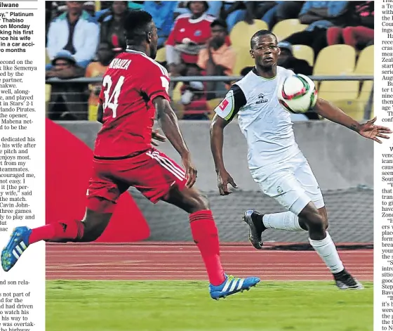  ?? PHOTO: VELI NHLAPO ?? THE HERO: Ndumiso Mabena of Platinum Stars, right, challenges Ntsikelelo Nyauza of Orlando Pirates in Monday ’ s clash, which Stars won 2-1 at Royal Bafokeng Sports Palace