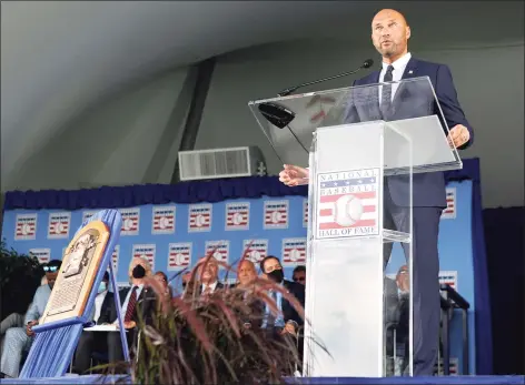  ?? Jim McIsaac / Getty Images ?? Derek Jeter gives his speech during the Baseball Hall of Fame induction ceremony at Clark Sports Center on Wednesday in Cooperstow­n, N.Y.