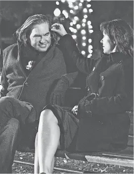  ??  ?? Val Kilmer and daughter Mercedes between takes on the set of “Paydirt,” in which they play father and daughter. EVAN DOHENY