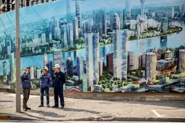  ??  ?? Affiche du quartier financier de Lujiazui à Pudong