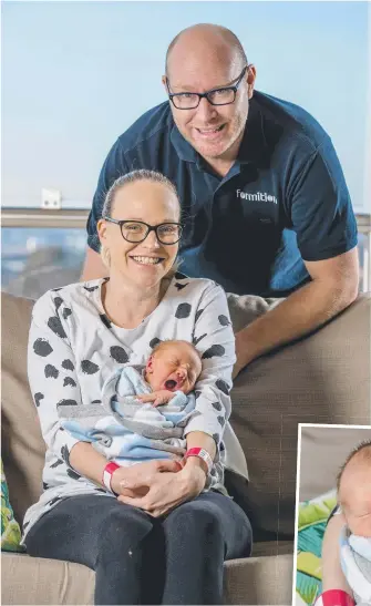  ??  ?? Proud parents Amy Mitchell and Brett Andrew with their newborn son Edwin James Mitchell-Andrew.