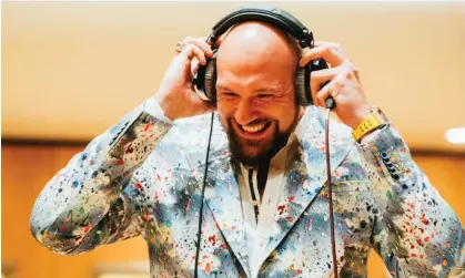  ?? ?? Tyson Fury at a recording session for his cover of Neil Diamond's Sweet Caroline. Photograph: Sarah Louise Bennett/Warner Music/PA