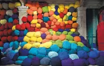  ??  ?? Exhibits in Venice include ‘‘Escalade Beyond Chromatic Lands’’ by Sheila Hicks and ‘‘Imitazione di Christo,’’ far right, by Roberto Cuoghi.