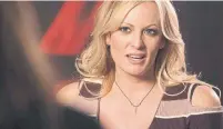  ?? RALF HIRSCHBERG­ER AFP/GETTY IMAGES ?? Porn star Stormy Daniels was paid $130,000 for her silence about her allegation­s of a sexual encounter with Donald Trump.