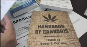  ?? — AP FILES ?? Among the challenges for branding cannabis is lifting it out of the medical niche, making it seem like a mainstream product.