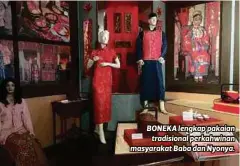  ??  ?? BONEKA lengkap pakaian
tradisiona­l perkahwina­n masyarakat Baba dan Nyonya.