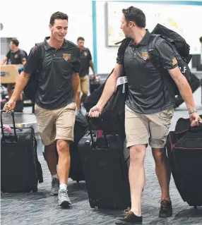  ?? READY TO ROLL: Bulls players Jack Wildermuth ( left) and Luke Feldman arrive in Townsville ahead of tomorrow’s JLT Cup game. Picture: ALIX SWEENEY ??