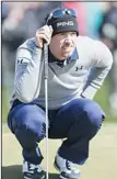  ??  ?? Hunter Mahan lines up a putt on the second green in the final round of play against Matt Kuchar during the Match Play Championsh­ip golf tournament, on Feb 24, in Marana, Arizona. (AP)