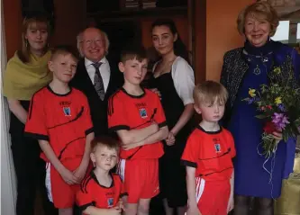  ??  ?? Support: Emma and family with President Michael D Higgins and wife Sabina