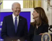  ?? Anna Moneymaker/Getty Images ?? President Joe Biden and Maria Shriver, the former first lady of California, laugh Monday during a Women's History Month reception in the East Room of the White House.