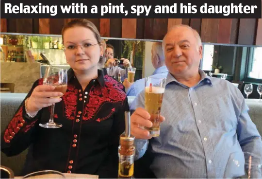  ??  ?? Before the drama: Former double agent Mr Skripal, , enjoying a beer in a Salisbury pub with his daughter Yulia, 33