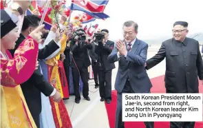  ??  ?? South Korean President Moon Jae-in, second from right, and North Korean leader Kim Jong Un in Pyongyang