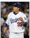  ?? AP/JAE C. HONG ?? Los Angeles starter Hyun-Jin Ryu went 7 innings Thursday, allowing just 4 hits with 8 strikeouts to lead the Dodgers over the Braves in Los Angeles.