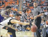  ?? [AP PHOTO] ?? Oklahoma State's Thomas Dziagwa, front, called next week's Big 12 Tournament “a new season,” but he added the Cowboys are primarily focused on Wednesday's game at Baylor.