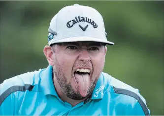  ?? FRANK GUNN THE CANADIAN PRESS ?? Robert Garrigus of the United States reacts to his tee shot on the 17th hole of at the Canadian Open golf tournament at Glen Abbey in Oakville on Thursday.