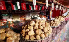  ??  ?? A large cache of truffles for sale at a market in al-Rai.